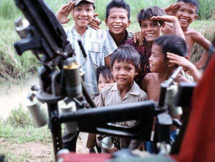 Kids at Ben Luc saluting and, of course, wanting